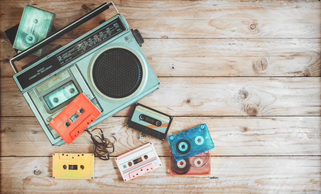 vintage boombox with mixtapes