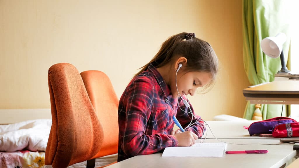 happy girl writing